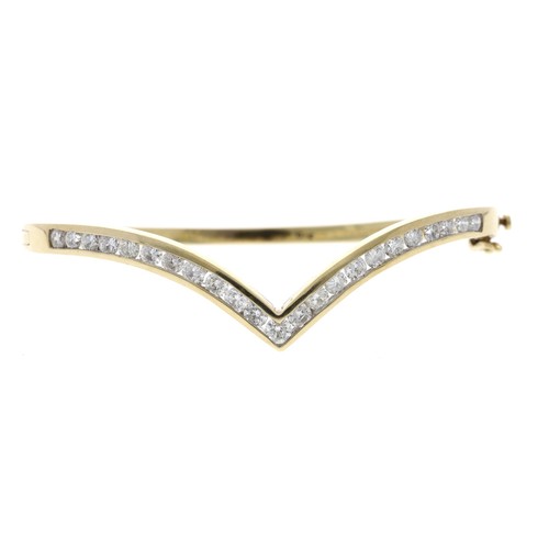 328 - Good 9ct yellow gold wishbone design diamond set bangle, circa 2003, round brilliant-cuts, estimated... 