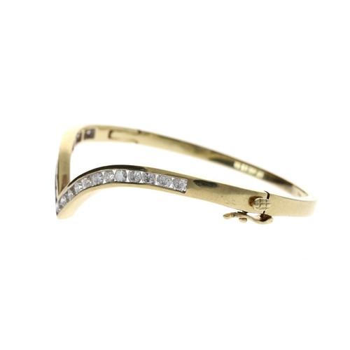 328 - Good 9ct yellow gold wishbone design diamond set bangle, circa 2003, round brilliant-cuts, estimated... 