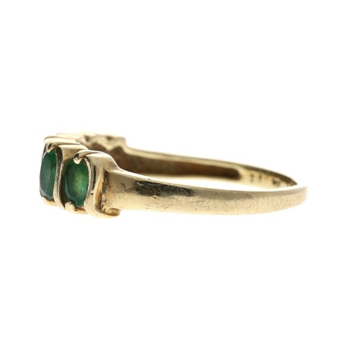 336 - Emerald five stone yellow gold ring, marked '10kt', width 5mm, 2gm, ring size L