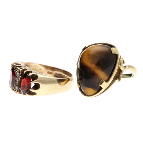 352 - 9ct garnet and clear stone set ring in a claw setting, Birmingham 1970, width 10mm, 6gm, ring size L... 