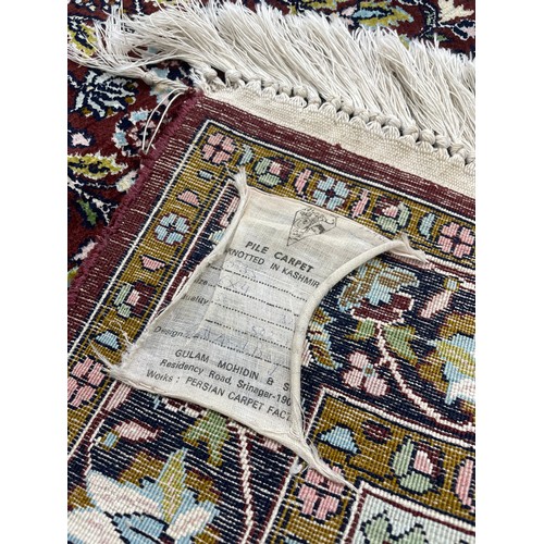 904 - Small Indian Kashmiri prayer rug by and labelled Gulam Mohidin & Son, 46