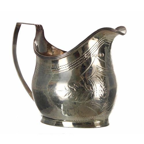 577 - George III silver helmet cream jug, having shallow engraved borders and shield cartouche, the m... 