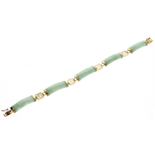 94 - Chinese 9ct mounted  jade curved panelled bracelet, width 8mm, 11.6gm, 7.25