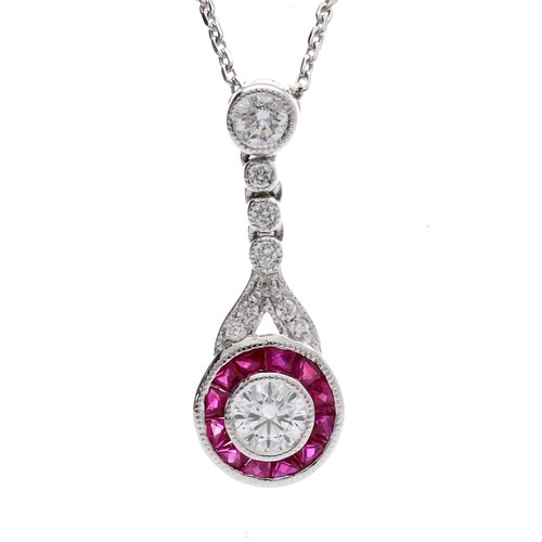 327 - Good quality modern 18ct white gold ruby and diamond pendant on a slender necklace designed by Luke ... 