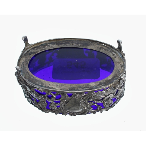 545 - German .800 silver oval salt, the pierced scroll and putti figural surround with blue glass liner, 3... 