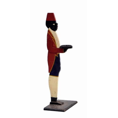 986 - 1920s figural dumb waiter, decorated as a gentleman in a red tunic and fez hat, 37