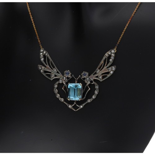 298 - Attractive 18ct and silver set blue topaz and diamond set double dragonfly necklace, the topaz 5.00c... 