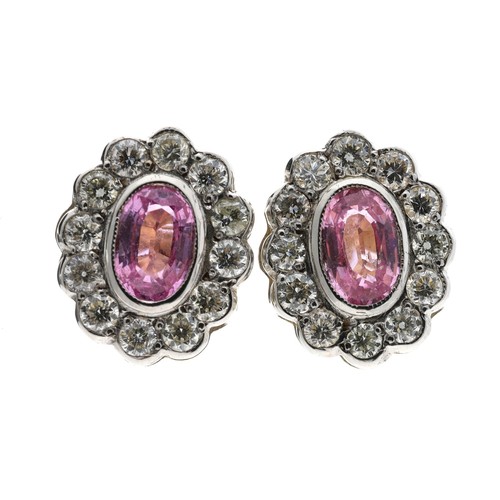 370 - Pair of modern 18ct pink sapphire and diamond oval cluster earrings, the sapphires 1.20ct approx in ... 