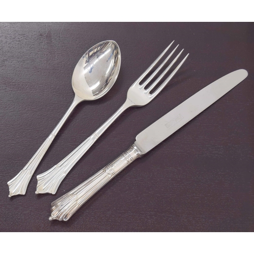 555 - United Cutlers Ltd. complete canteen of silver Art Deco pattern cutlery; comprising two table spoons... 