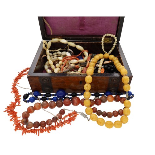 90 - Collection of assorted bead necklaces to include a pale amber necklace, 65.6gm; two coral necklaces,... 