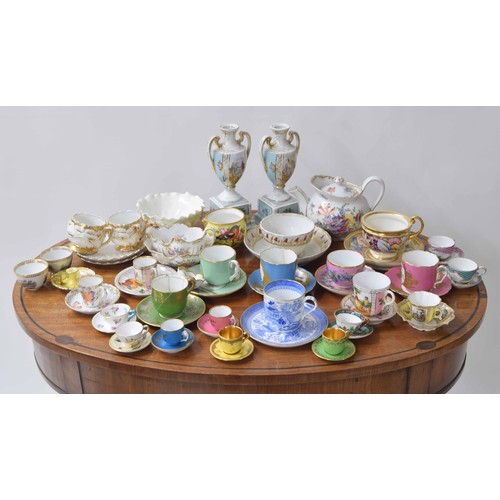 724 - Group of assorted porcelain tea cups and saucers various; including miniature examples and including... 