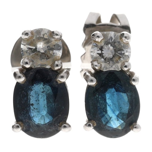 299 - Pair of 18ct white gold sapphire and diamond stud earrings, the sapphires each 0.50ct approx, round ... 