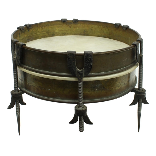 1505 - Brass cased drum with six iron tensioners, three of which are extended to spikes, head diameter 35.0... 