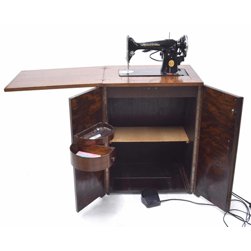 62 - Singer 201K sewing machine in cabinet, circa 1947 serial no. EE297816 with foot pedal and accessorie... 