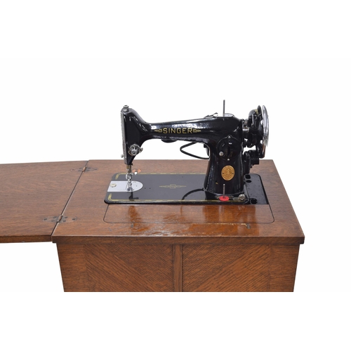 62 - Singer 201K sewing machine in cabinet, circa 1947 serial no. EE297816 with foot pedal and accessorie... 