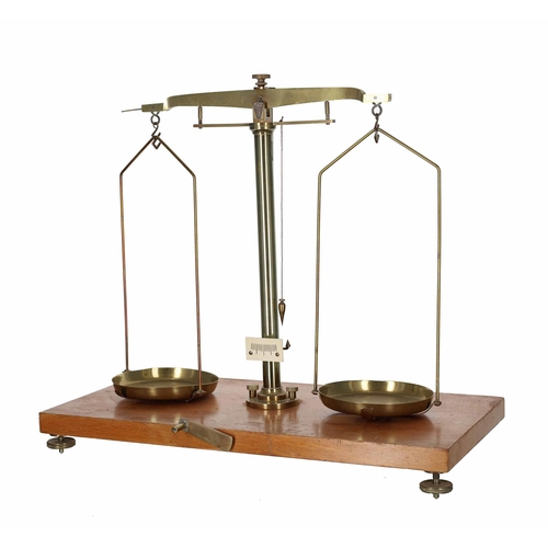 56 - Set of vintage brass linen scales, mounted on a wooden base, 15.5