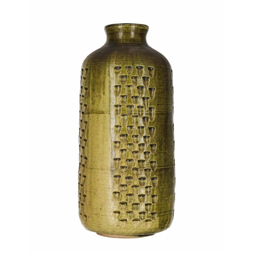 59 - Studio pottery vase, decorated with impressed texture panels with a variegated green glaze, bearing ... 