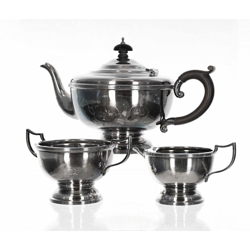 31 - George V silver three piece tea set; comprising tea pot, jug and sucrier, maker Marson & Jones, ... 