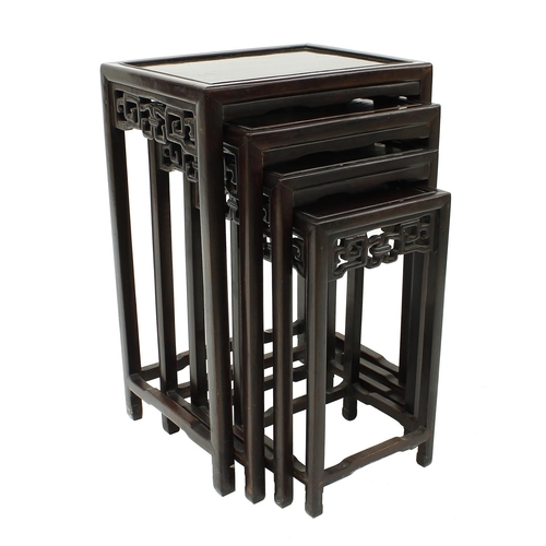 1625 - Chinese hardwood quartetto nest of occasional tables, the rectangular moulded tops over pierced fret... 