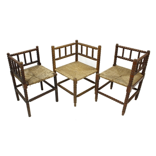 1637 - Three similar 19th century bobbin turned corner chairs, with rush seats (3)