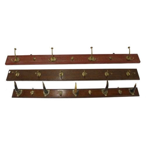 1640 - Early 20th century oak wall hanging coat rack set with six brass hooks, 54