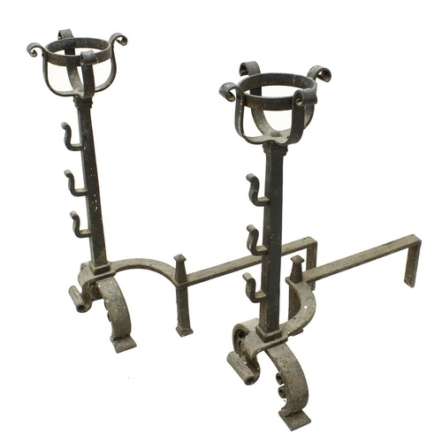 1602 - Pair of large 17th century style wrought iron andirons, with basket tops upon tapered columns, mount... 