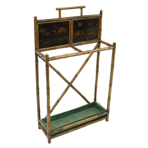 1613 - Aesthetic bamboo and black lacquer stick stand, inset with two panels depicting birds amidst foliage... 