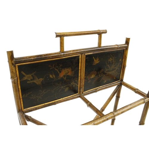 1613 - Aesthetic bamboo and black lacquer stick stand, inset with two panels depicting birds amidst foliage... 