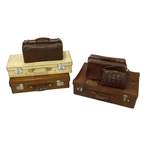 1135 - Two vintage tan leather suitcases; together with a vintage case, two leather Gladstone type bags and... 