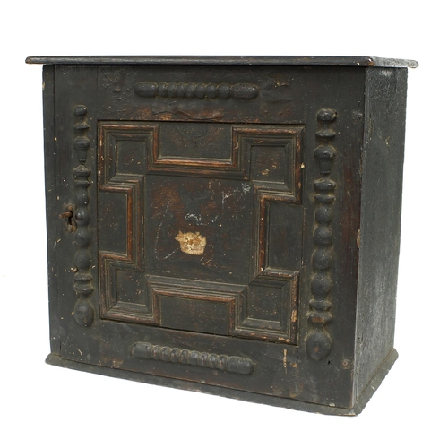 1686 - 18th century oak spice cabinet, the geometric panelled door enclosing an interior with eight small d... 