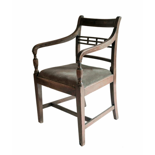 1708 - Regency mahogany carver chair, the horizontal rail back over a drop-in seat and upon square tapered ... 