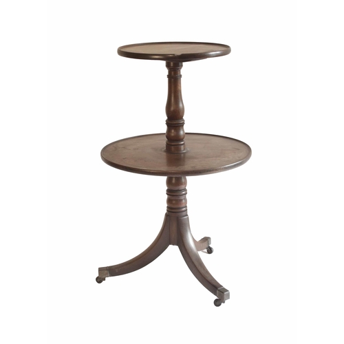 1728 - George III circular mahogany two tier dumb waiter, with graduated tiers upon a turned column and tri... 