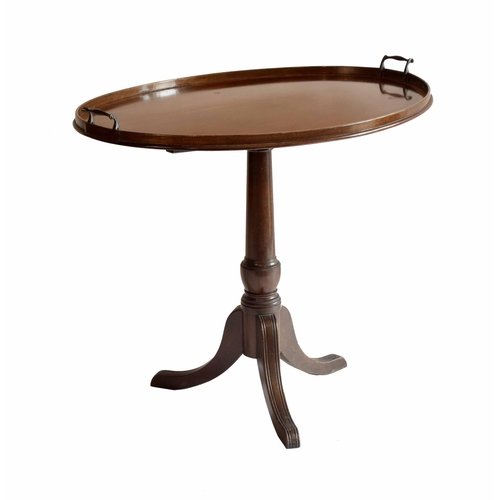 1739 - Mahogany oval tilt tray-top tripod occasional table, with twin brass handles, crossbanded with rosew... 