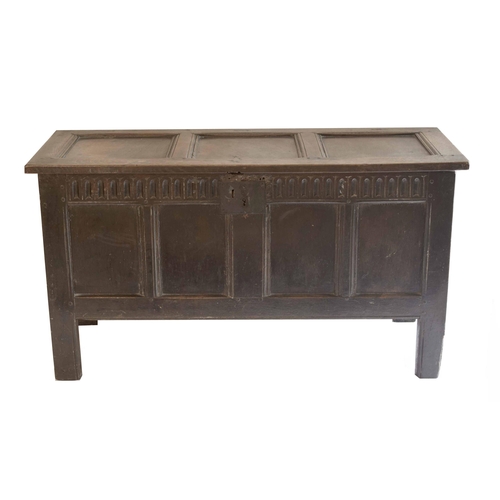 1763 - 18th century oak panelled coffer, the hinged top enclosing an vacant interior and candle compartment... 