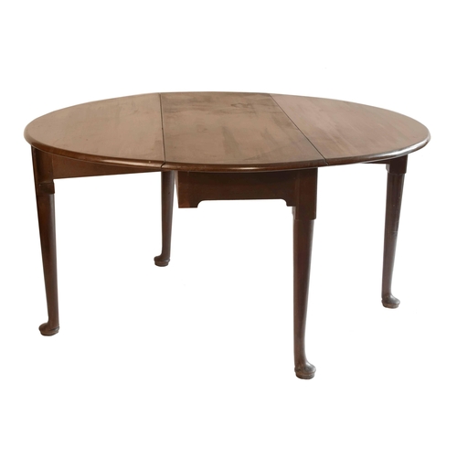 1781 - Georgian Cuban mahogany oval gateleg table, with cylindrical tapered legs terminating with pad feet,... 