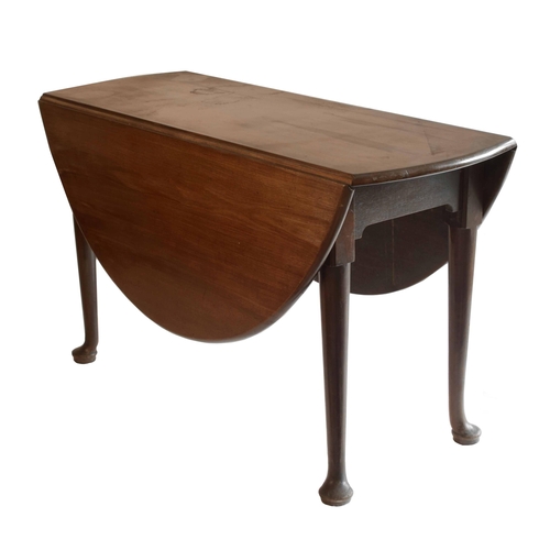 1781 - Georgian Cuban mahogany oval gateleg table, with cylindrical tapered legs terminating with pad feet,... 