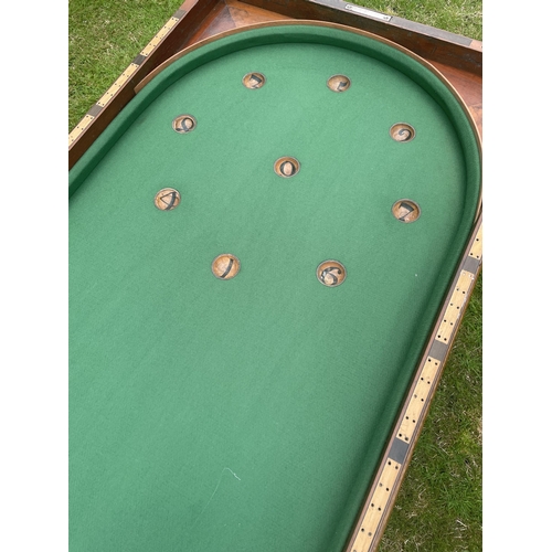 1786 - Large table-top mahogany folding bagatelle board upon a bespoke made stand, 48