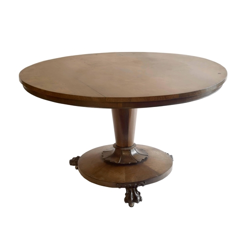 1824 - Victorian rosewood circular centre table, the tilt-top upon a tapered cylindrical column and circula... 