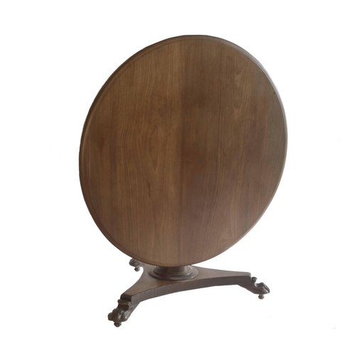 1824 - Victorian rosewood circular centre table, the tilt-top upon a tapered cylindrical column and circula... 