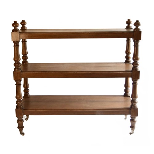 1840 - Late Victorian oak three tier buffet, with turned supports and feet upon white ceramic castors, 48