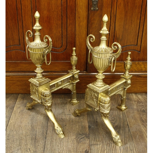 1188 - Good pair of 19th century brass andirons, modelled with classical twin handled urns over a cast base... 