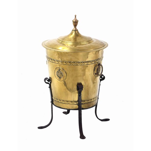 1117 - Neoclassic style circular brass fireside bin and cover, with urn finial over swing handles and Tudor... 