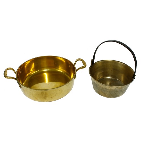 1217 - Heavy polished brass twin-handled saucepan, 17