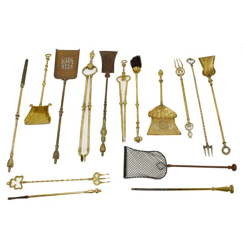 1344 - Assortment of 19th century and later fire irons to include shovels, tongs and pokers... 