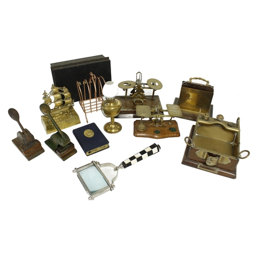 1149 - Group of antique and later stationery and desk items, including an oak and brass letter rack, small ... 