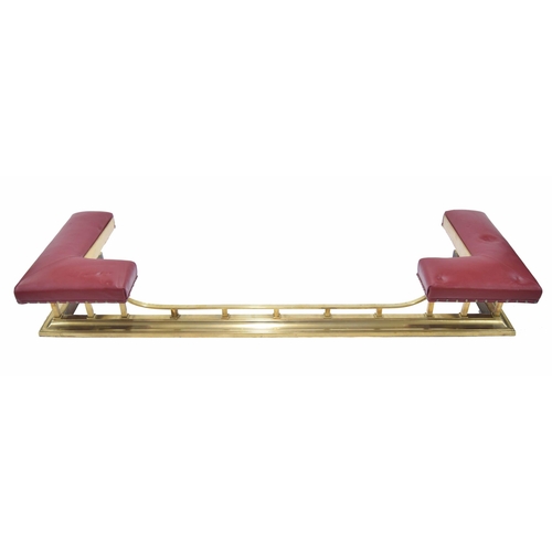 1144 - Good Victorian style brass low club fender, with corner padded red leatherette seats upon short squa... 