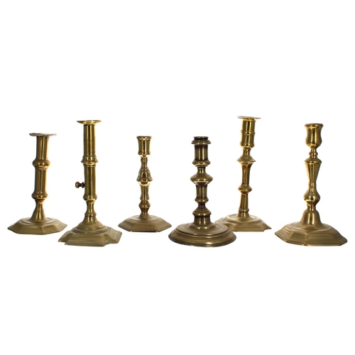 1120 - Six assorted 18th century single brass candlesticks, one with a side ejector, 6.5