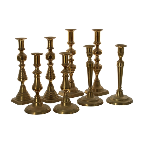 1119 - Four pairs of Victorian brass candlesticks, from 9