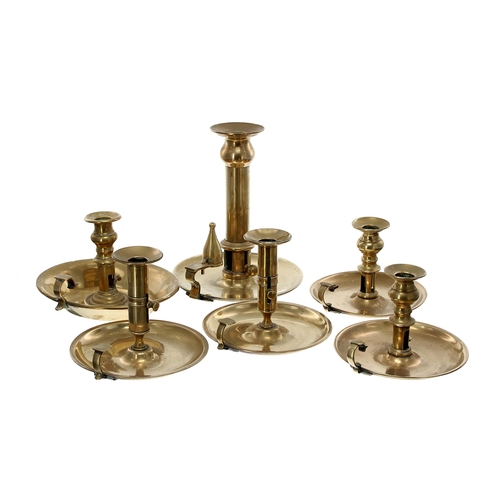 1331 - Collection of six 19th century brass chambersticks, the larger example with a candle snuffer, 9