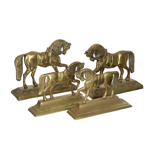 1316 - Pair of Victorian brass horse doorstops with heavy cast bases, 8.25